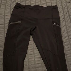 Lululemon Athletica Black Leggings with Zipper Pockets.